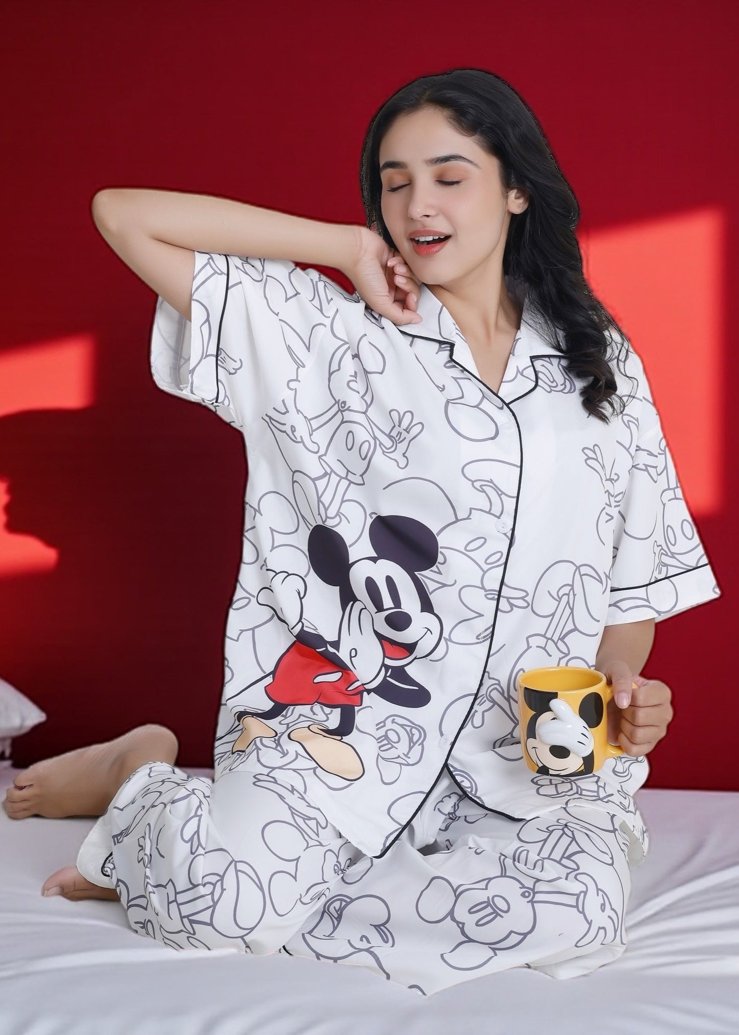 White crepe pyjama set with oversized Mickey Mouse print. Soft, relaxed, and luxe loungewear by WakeUp Chicq for Disney lovers.